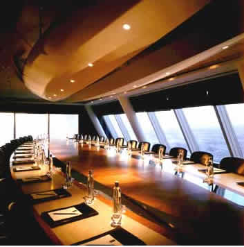 Coference Room.  Our private Conference Room, situated on the 27th floor, is equipped with a large 60 inch plasma screen teleconferencing facility.  Seating up to 30 people it is the ideal way to talk business with your clients